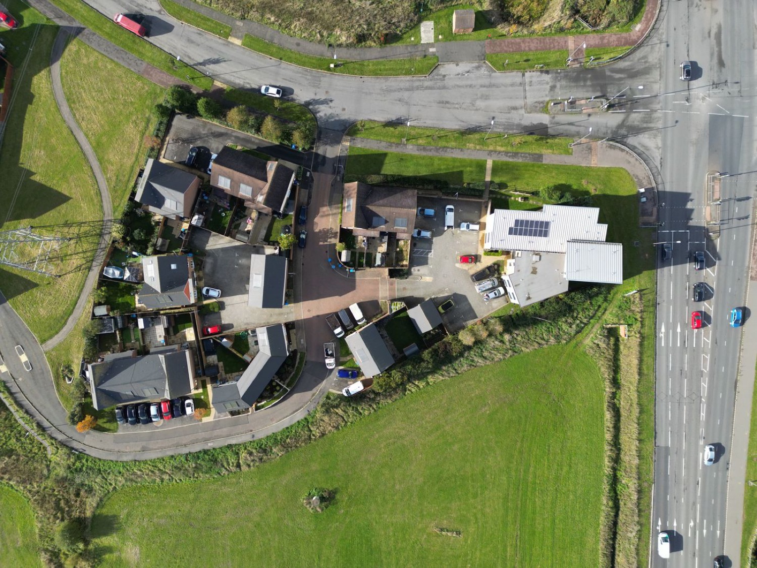 Aerial view of a residential neighbourhood of houses and driveways